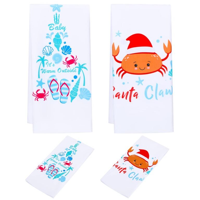 Two white beach towels with crab and seashell designs