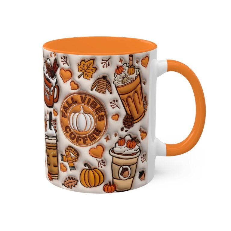 White mug with orange handle and fall-themed coffee and pumpkin designs