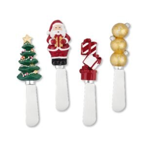 Four Christmas-themed cheese spreaders with festive tree, Santa, gifts, and ornaments