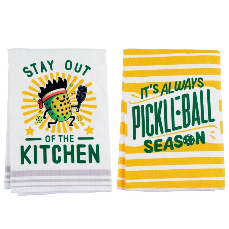 Two kitchen towels with pickleball-themed graphics and text