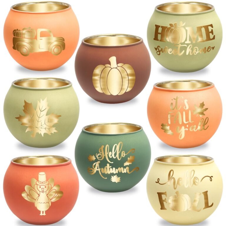 Nine fall-themed candle holders with gold accents and seasonal designs