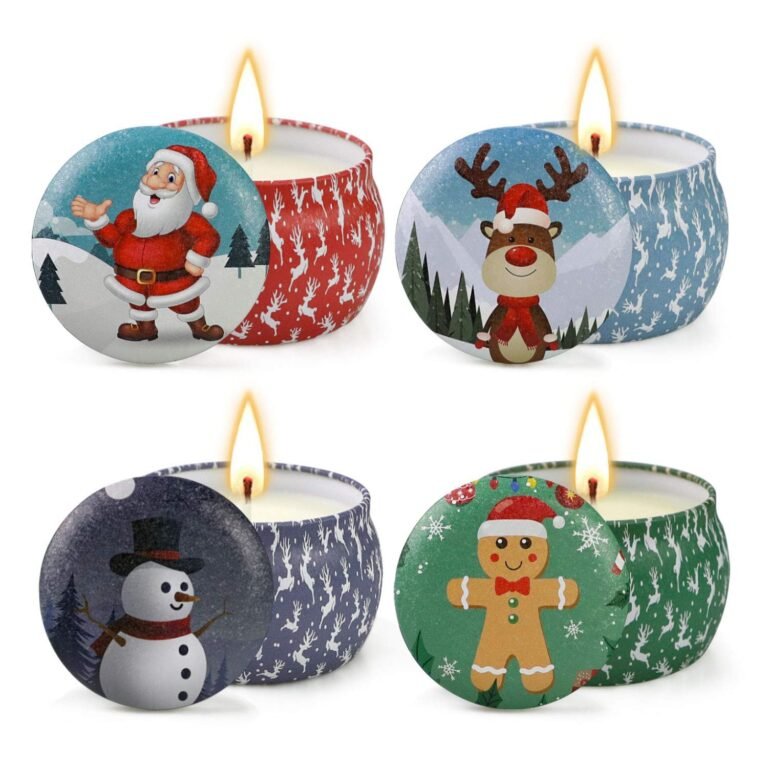 Four lit Christmas-themed candles with festive lids featuring Santa, reindeer, snowman, and gingerbread man