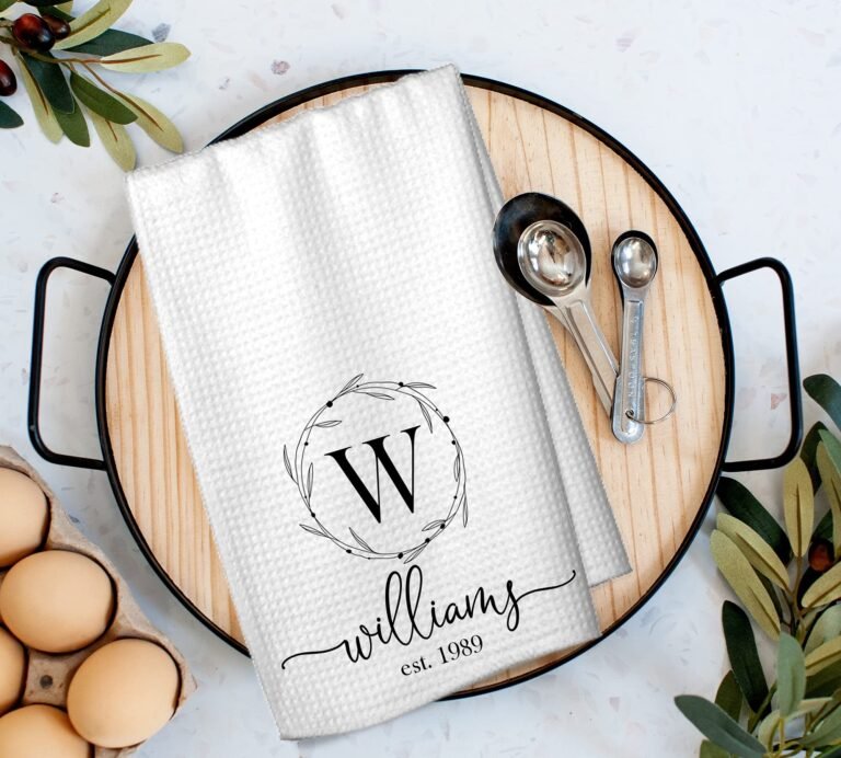 White kitchen towel with "Williams" name and initial "W" on tray