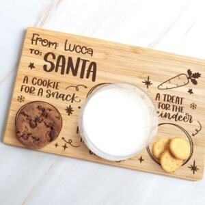 Wooden tray with milk, cookie, crackers, and text for Santa and reindeer