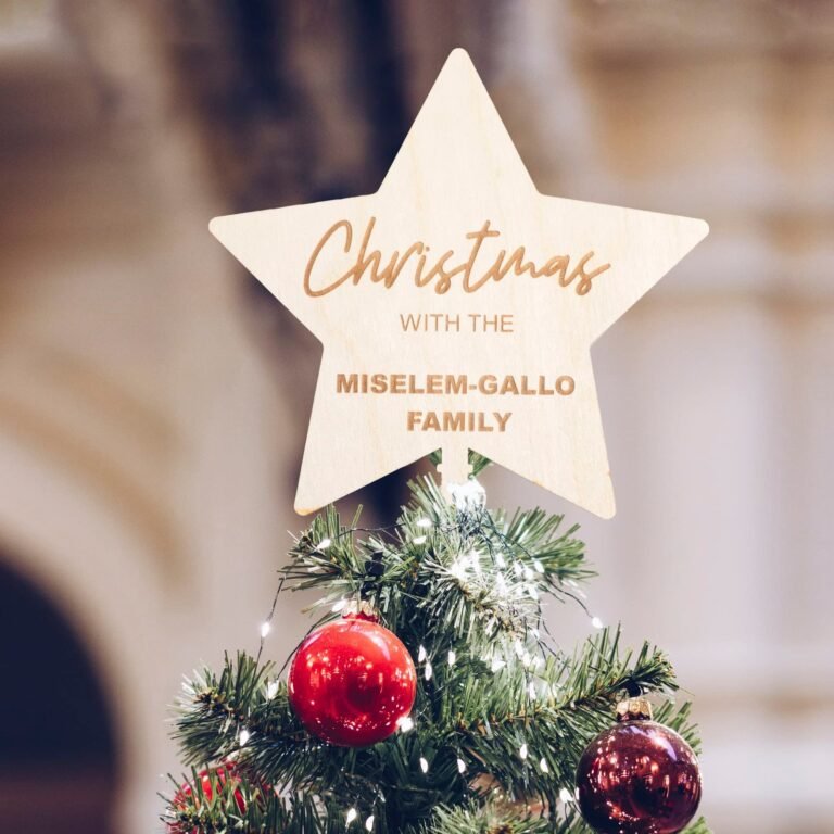 Christmas tree with star topper, red ornaments, and family name