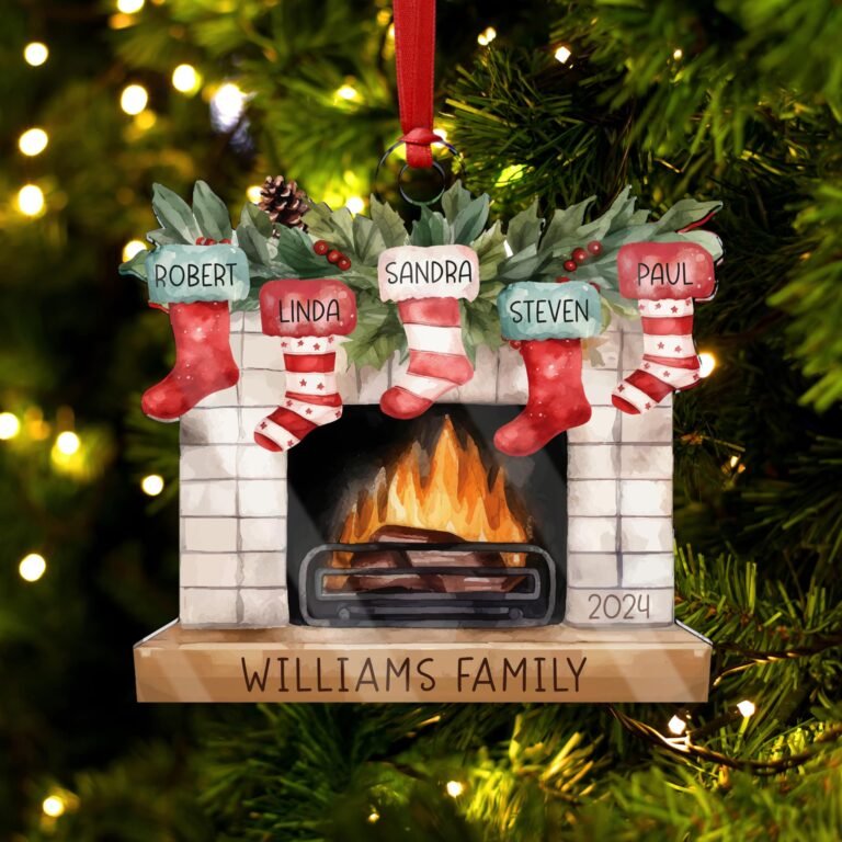 Christmas ornament with family names on stockings above a fireplace